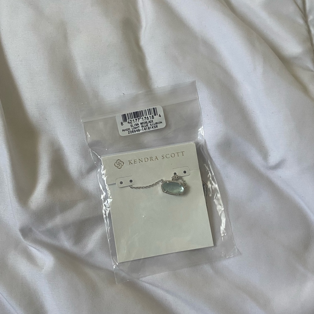 light blue kendra scott necklace